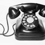 photo of black rotary telephone